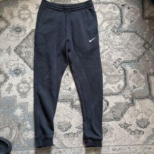 Nike Black Kids Sweatpants with White Swoosh